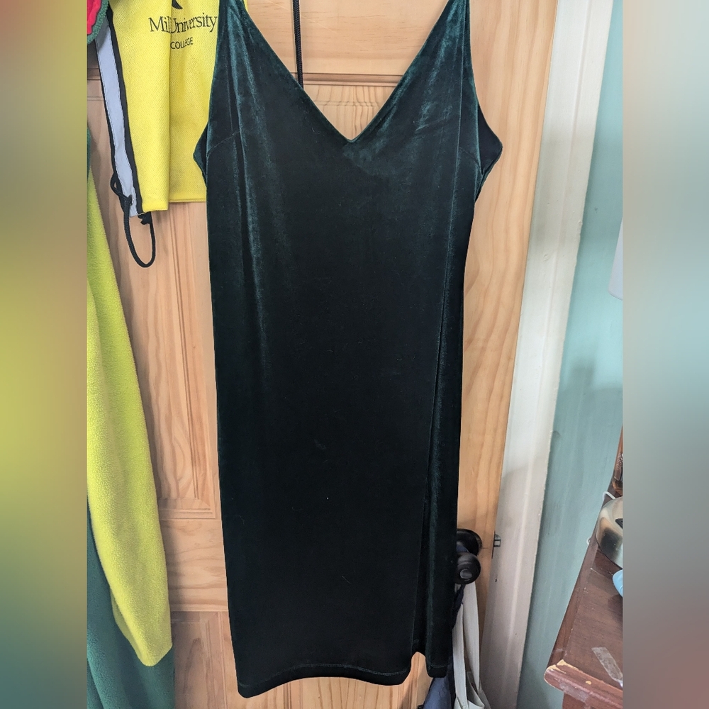 Tight green velvet dress